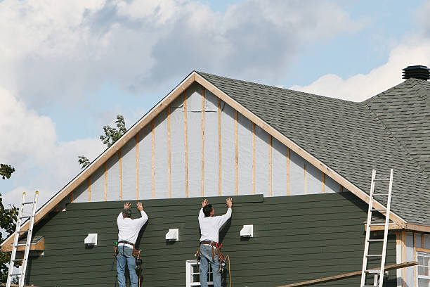 Professional Siding Installation technician working in Columbia, CT
